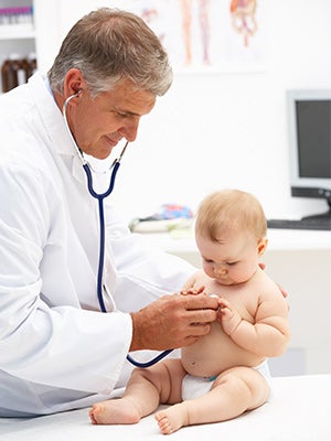 Pediatrician with baby